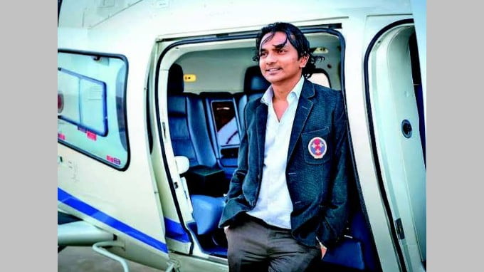 Divyank Turakhia Standing Near Helicopter